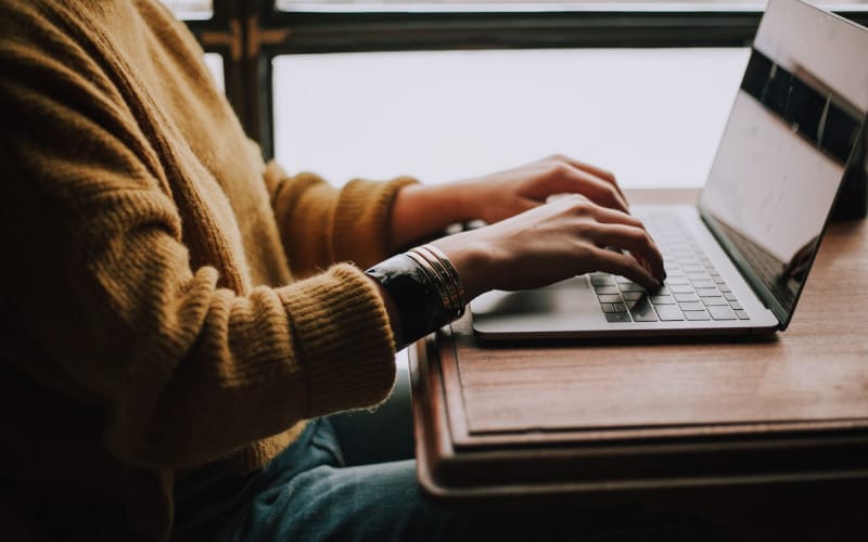 Website copywriting on laptop